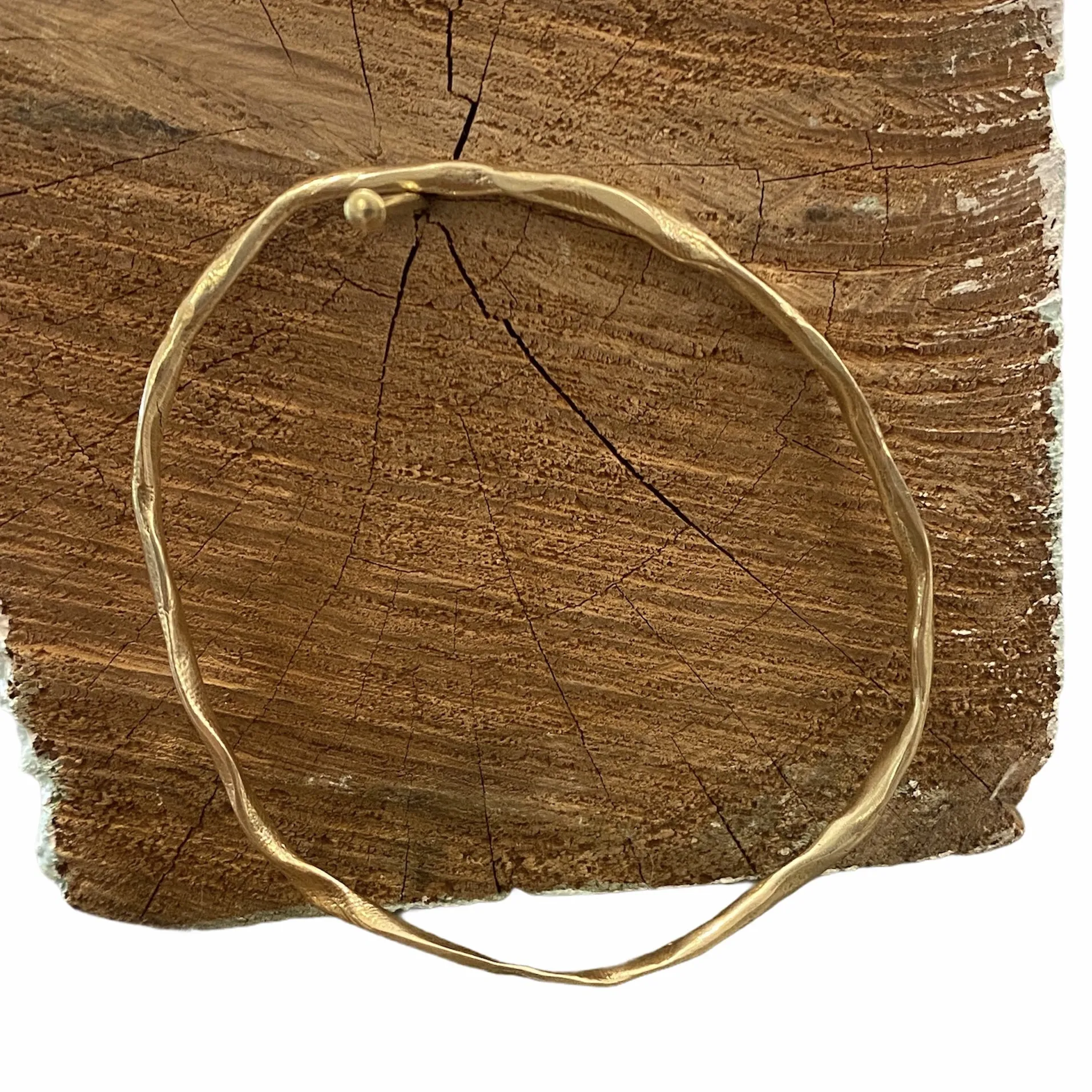 Organic gold bangle